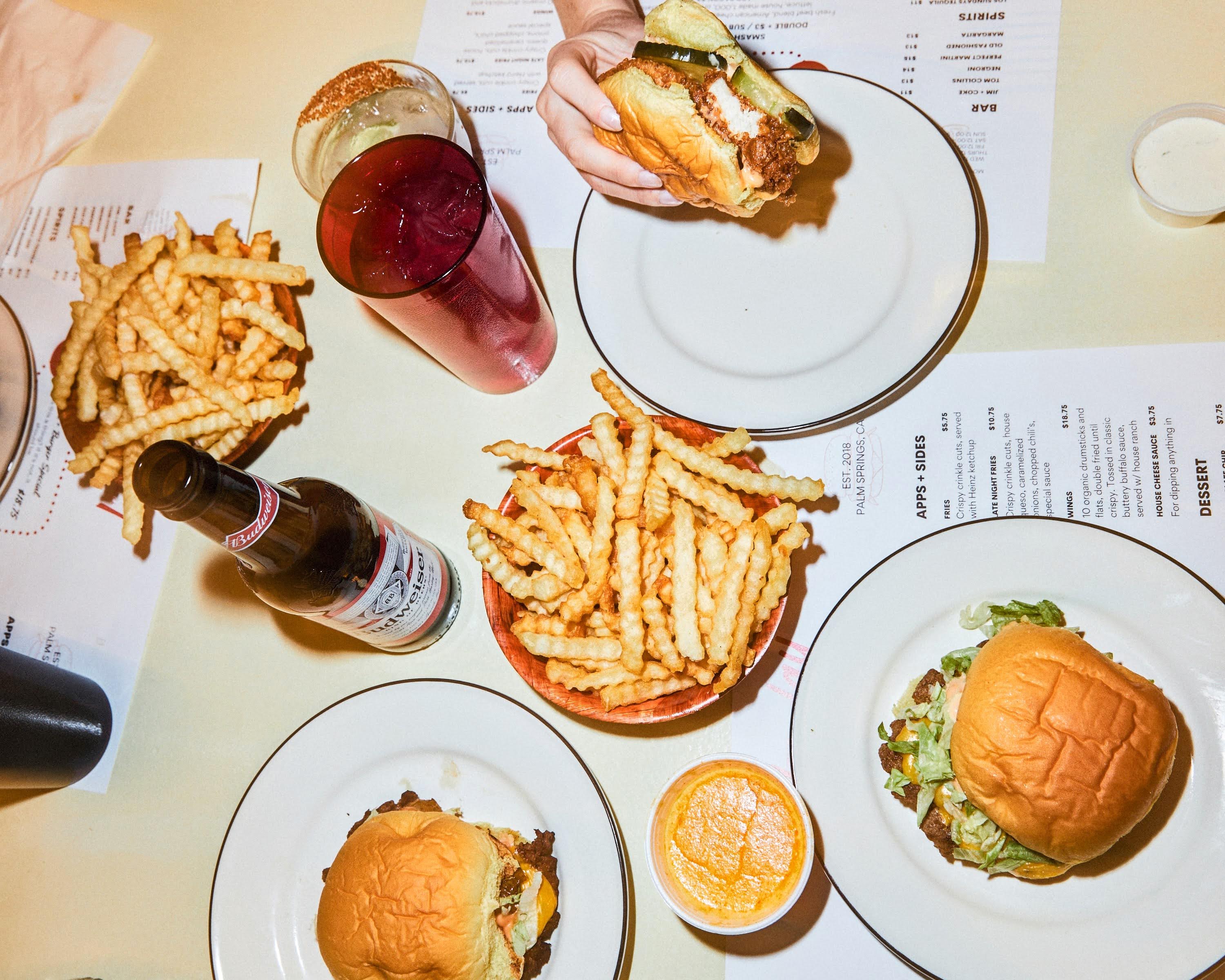 Burgers, beer, dipping sauces, and fries at The Heyday restaurant in Palm Springs.